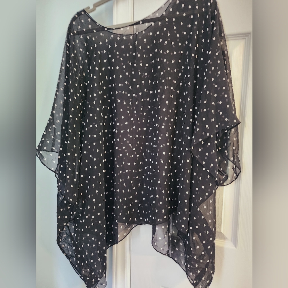 A symmetrical overlay shirt